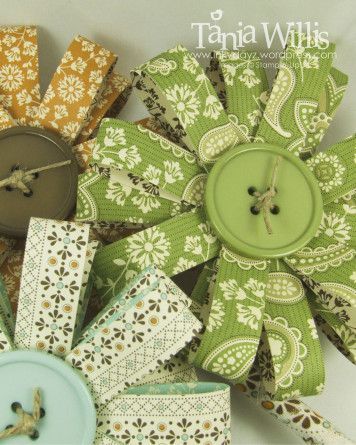 This tutorial is for making these cute flowers complete with fabric wrapped penc
