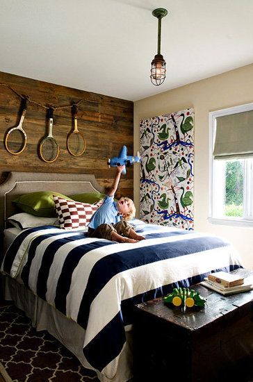 What a gorgeous kids bedroom!  Nautical stripes with vintage tennis rackets!