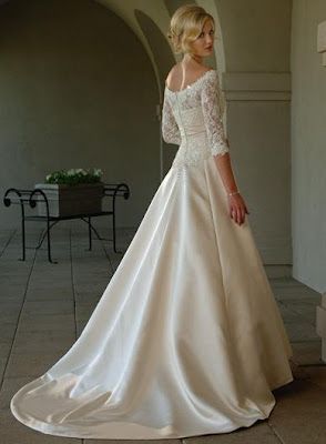 White lace wedding dresses with sleeves, close to the one I wanted. If we ever r