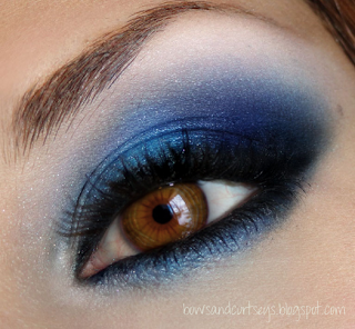 A range of intense blue eyeshadows with black liner for brown eyes
