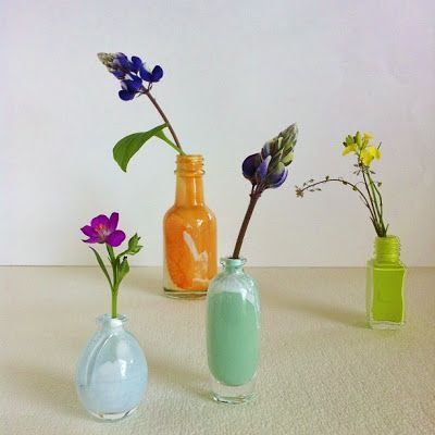 All these mini bud vases are painted mini bottles.  I love this because I have a