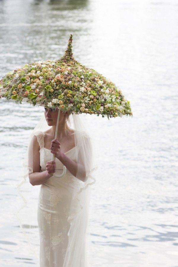 Wedding Day Floral Umbrella. This is pretty…I hear if it rains on your wedding