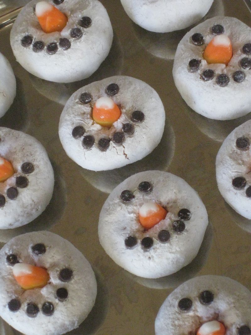 another version of the snowman doughnuts, using upside down mini choc. chips and