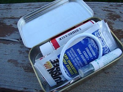 first aid kit for our car or purse out of an altoid tin! genius! :)