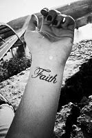 Having the word Faith tattooed on you arm doesnt make you  a Christian just like
