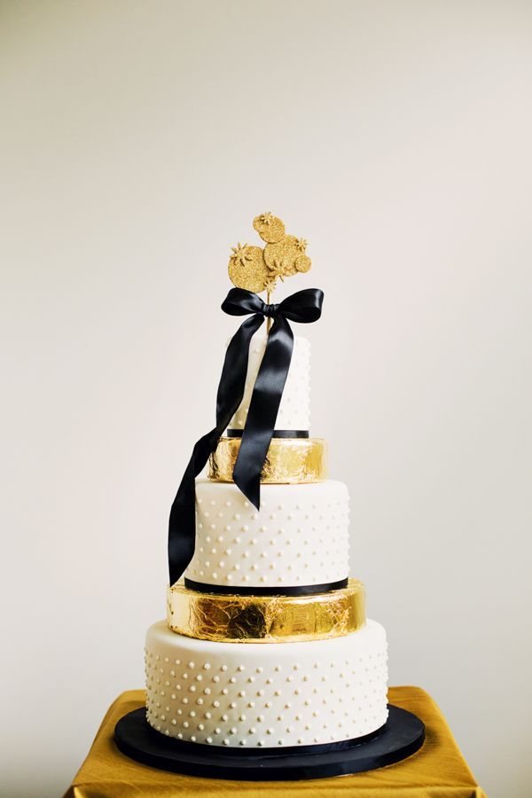Black & Gold NYE Wedding: gold dusted wedding cake by Anna Elizabeth Cakes.