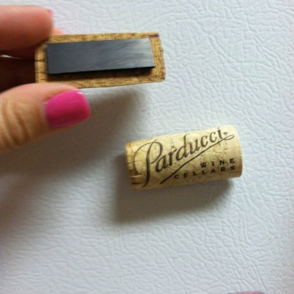 DIY Cut wine corks in half, hot glue to magnet and now you have cute cork magnet