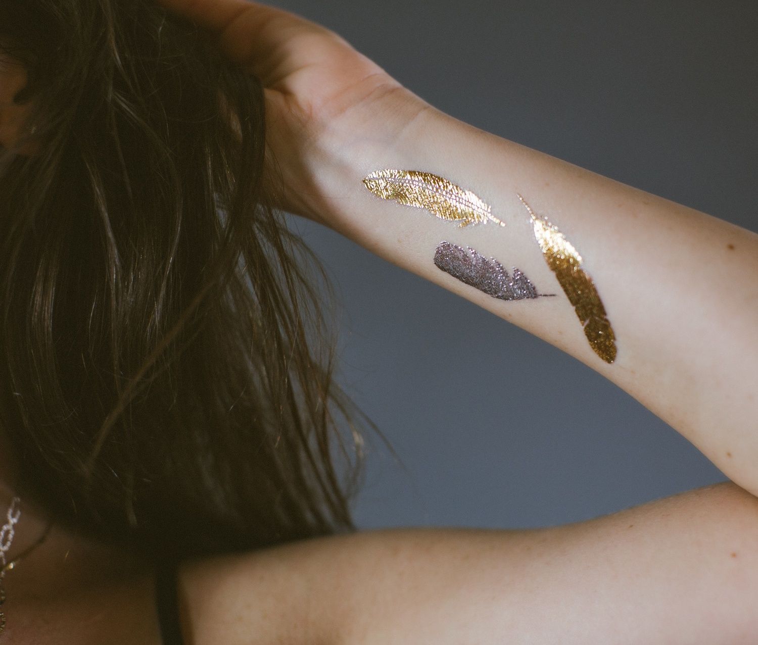 gold temporary tattoos! How cool would it be if they could make gold ink that wa