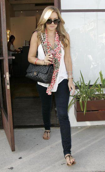 how2wear black jeans w/ relaxed white cami, long thin back-n-red scarf, and flat