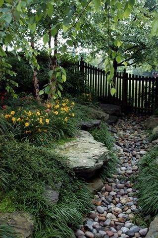 I like the idea of a creek bed without the creek, just the illusion of water.