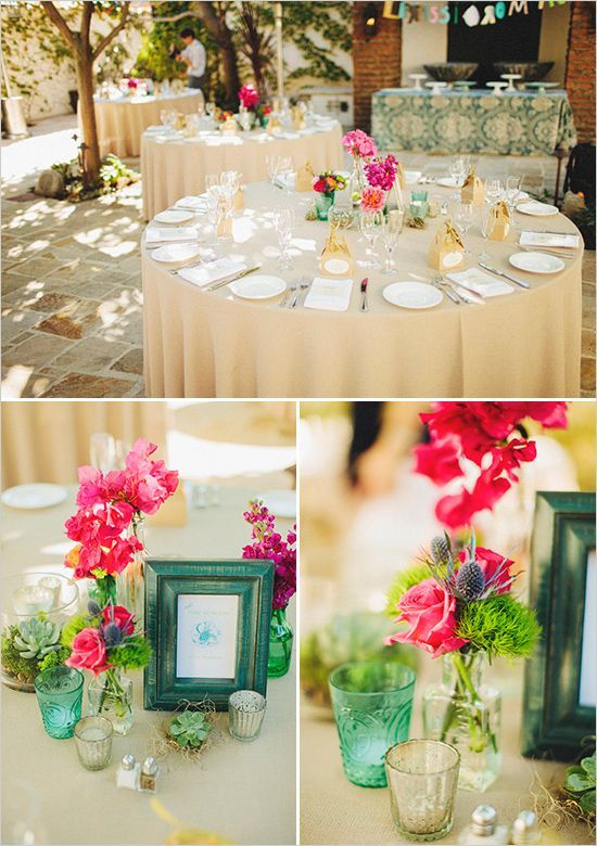 Simple flower arrangements on the tables and I love that colored picture frame f