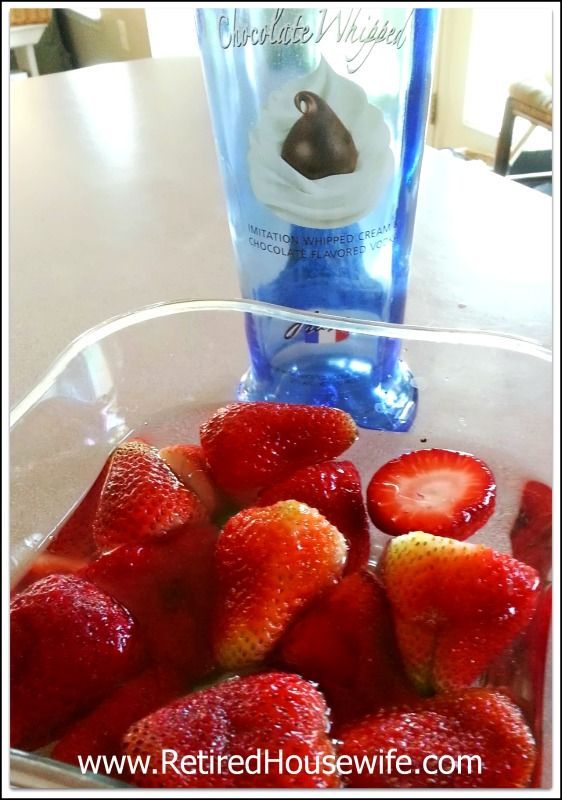 Strawberries soaking in Pinnacle Chocolate Whipped Vodka. Should I dip them in c
