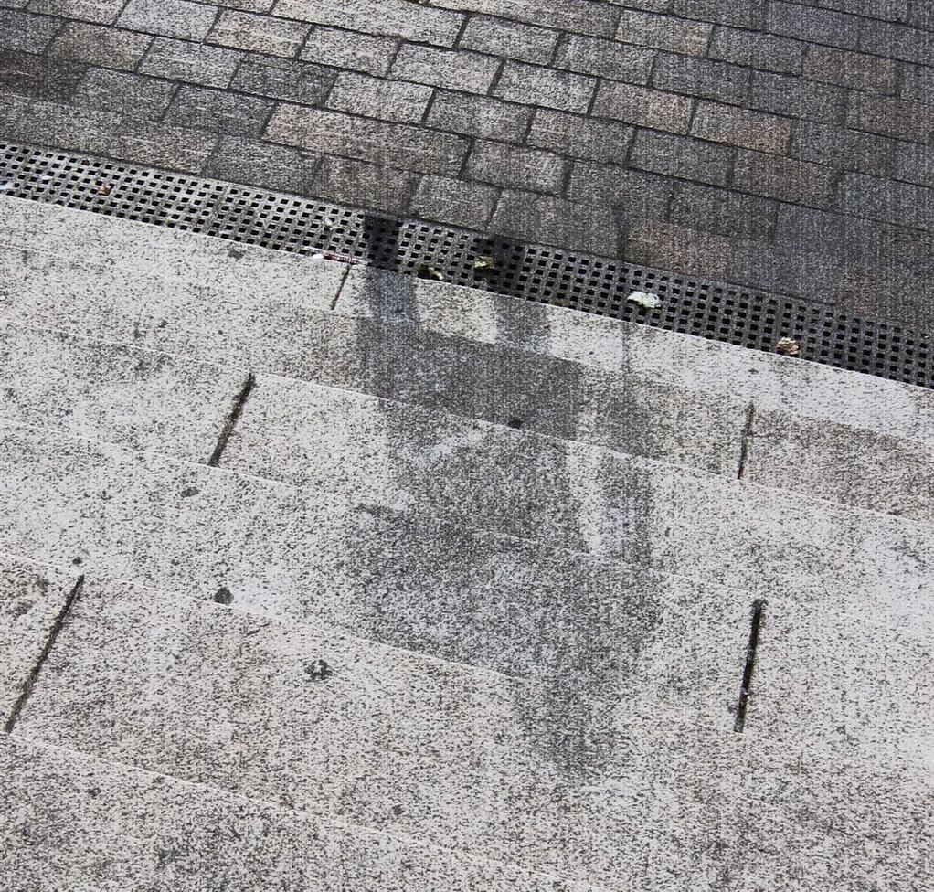 The “shadow” of a Hiroshima victim, permanently etched into stone steps, after t