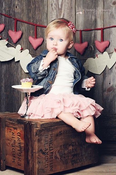 Valentines day baby first birthday photo shoot. Love the heart garland