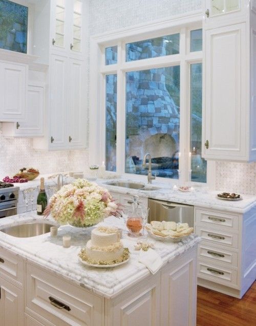 white marble kitchen | bright and romantic white kitchen with marble countertops