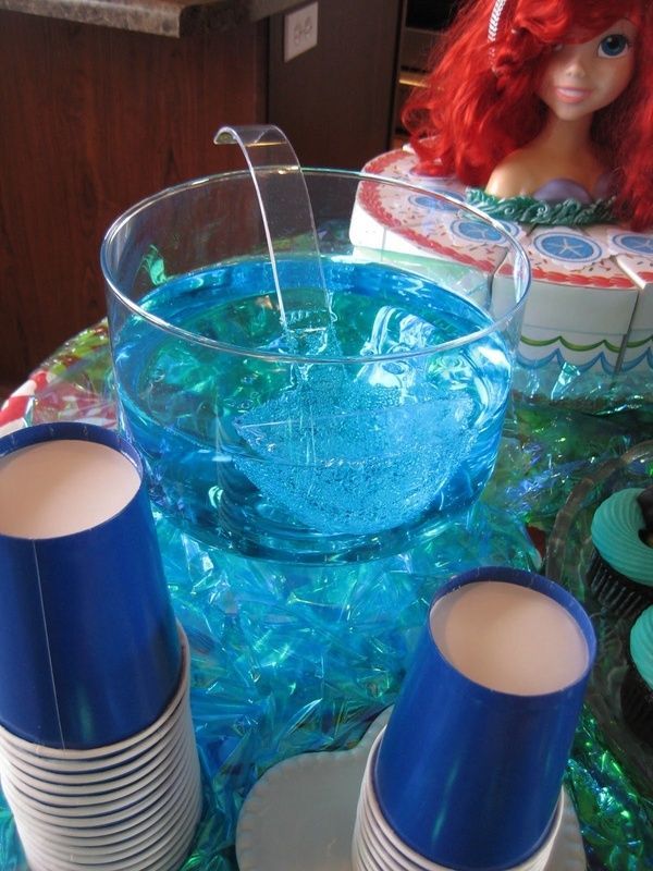 2 Bottles of Sprite  2 drops of blue food coloring. Perfect for Under The Sea Bi
