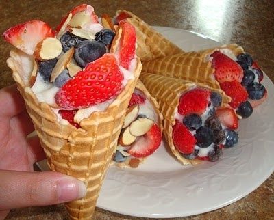 Freeze yogurt in a waffle cone and top with fresh fruit! healthy desserts. LOVE