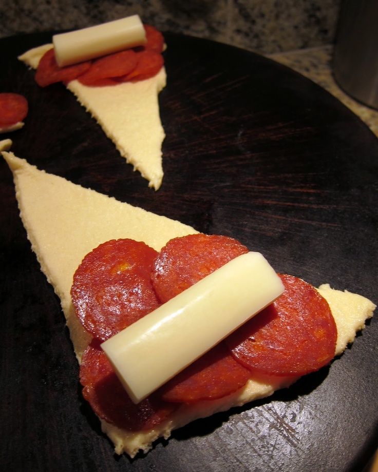 Great idea! Crescents, pepperoni, 1/2 string cheese, roll up, sprinkle w/garlic