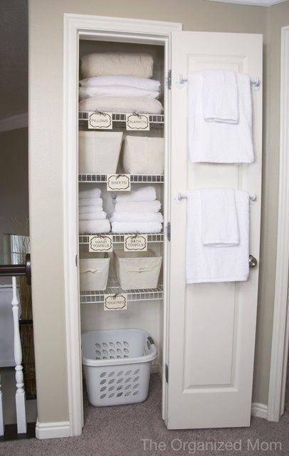Guest room closet- like the idea of a laundry basket in there for guests to put