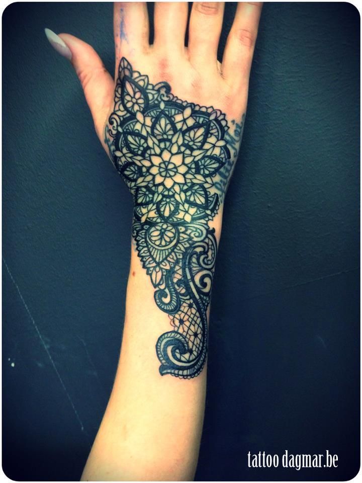 lace tattoo on hand-maybe if it had a softer look to it