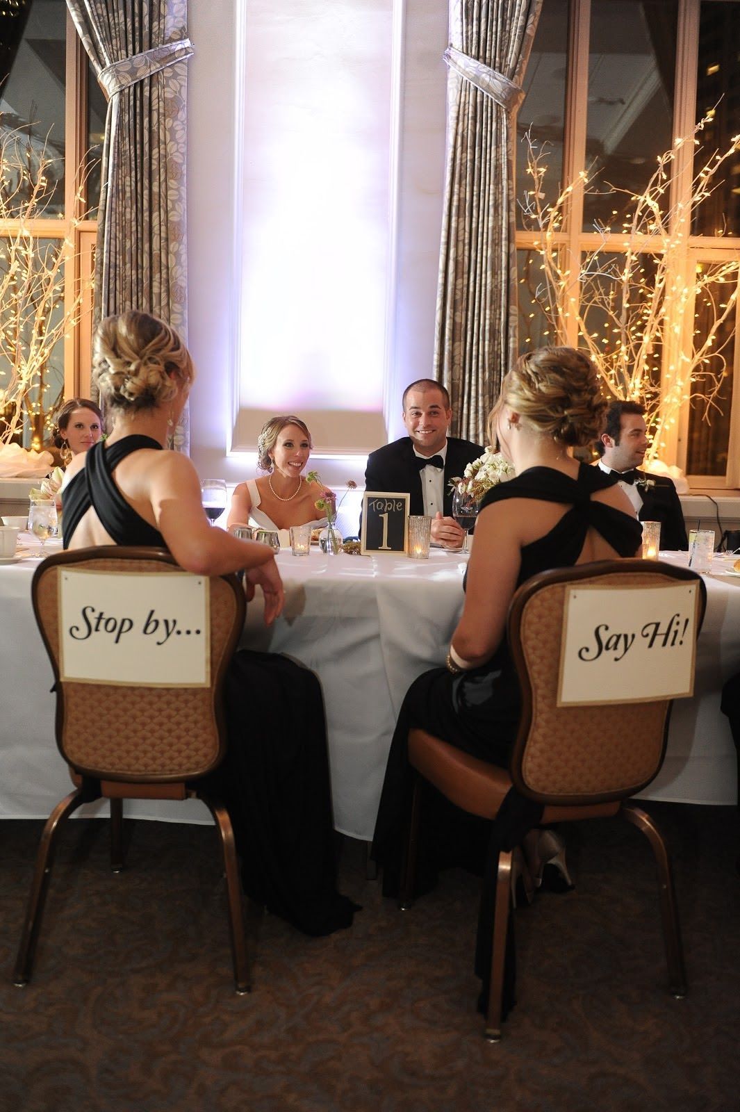 Love this idea!  Having empty chairs across from the bride and groom is a Scandi
