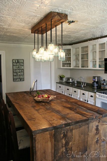 Love this kitchen! Especially the light and island. Mason Ball Jar Light and Rus