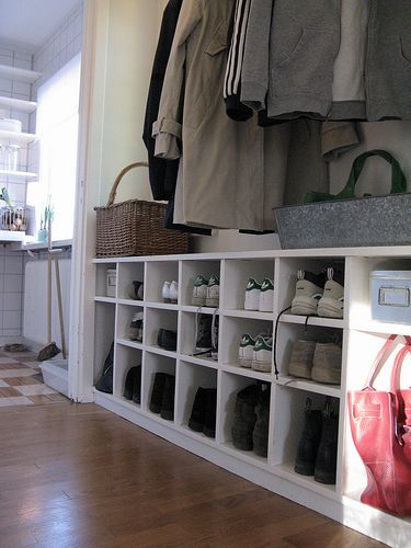Mud room: bottom shelf for boots, then shoes, then hooks for coats, umbrella, ba