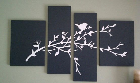 Take 4 canvases (2 of each size), paint them a solid base color and add vinyl or