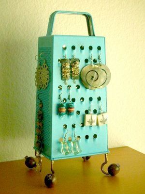 Turn a cheese grater into an earring holder by painting it and attacking small h