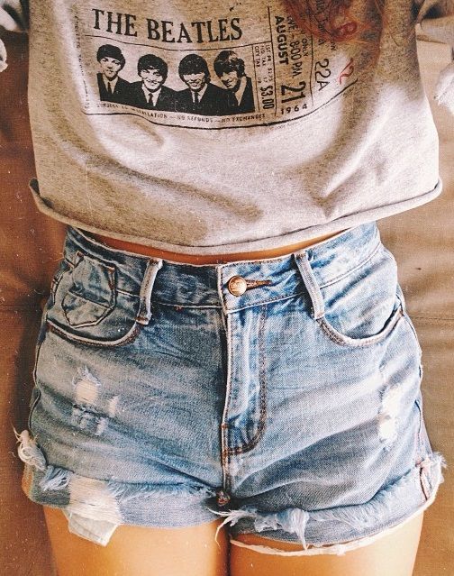 Beatles crop top with high waisted shorts.