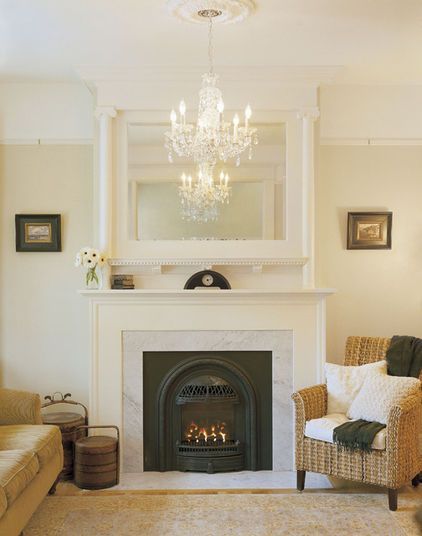 Beautiful!  This is a Valor gas fireplace with a carrara marble surround. The mi