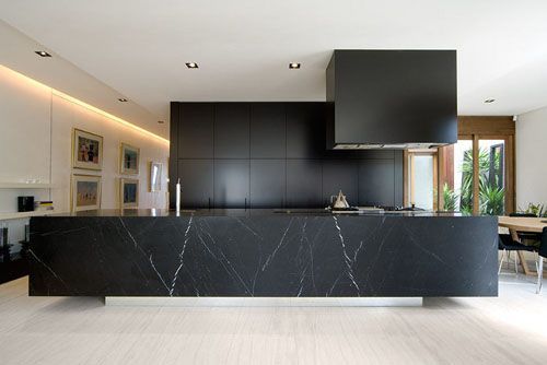 Black marble kitchen island. I would love to design and build one. Chamberlain J