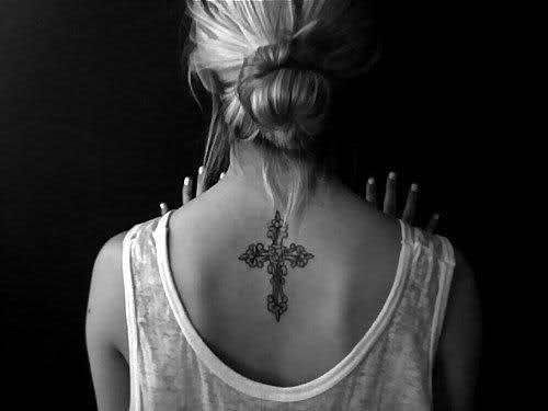 cross tattoo. Actually getting this on the side of my ribs my 18th bday:) cant w
