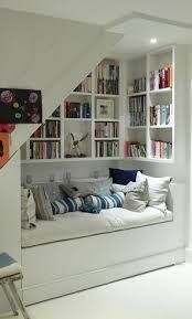Family Room: reading nook surrounded by bookshelves… this totally makes me thi