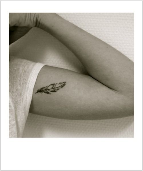 feather tattoo: “my worries are light as a feather as God carries them for me”