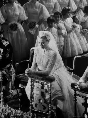 Grace Kelly praying during her Catholic wedding ceremony to Prince Rainier of Mo