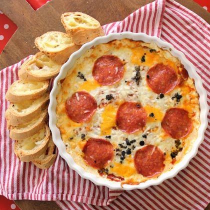Hot Pizza Dip – perfect for a potluck impaired person. Like me. Looks yummy.