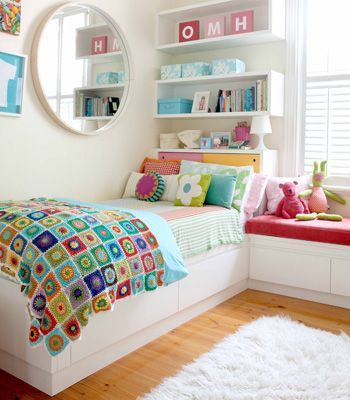 Love the white with bright colours and shelves – fantastic for a girls room. Fro