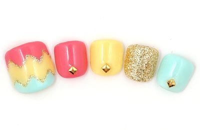 Pastel colours for toe nails with golden glitter and studs.