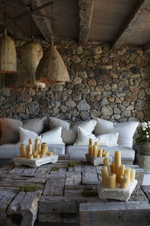 Rustic Patio – Warm summer evening, sun is almost set, candles lit, wine in hand