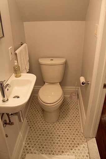 Small powder room – note the half size, but still stylish, sink