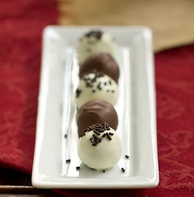 Super Easy Oreo Truffles! 1 package of finely crushed oreos and 1 package of cre