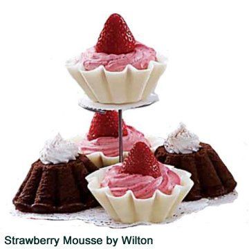 This light mousse is piped into candy shells made with Wiltons candy melts