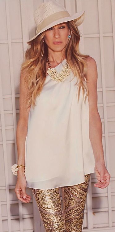 White and Gold.  Sarah Jessica Parker. Use my white fedora, gold sequin top and