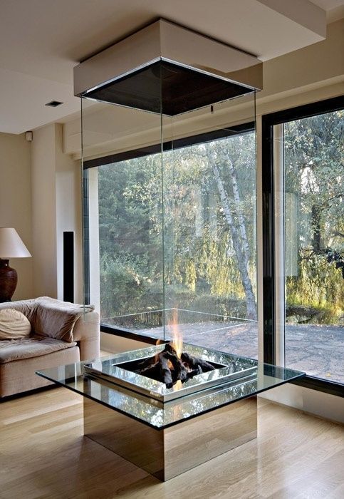 A Glass-Encased Fireplace | 36 Things You Obviously Need In Your New Home