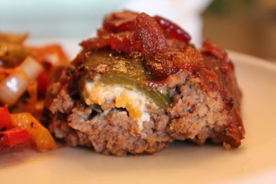 Amazing Smoked Meatloaf stuffed with cream-cheese filled jalapeo and topped with