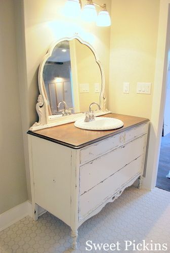 Dresser made into bathroom vanity; I would put the sink either to the right or l