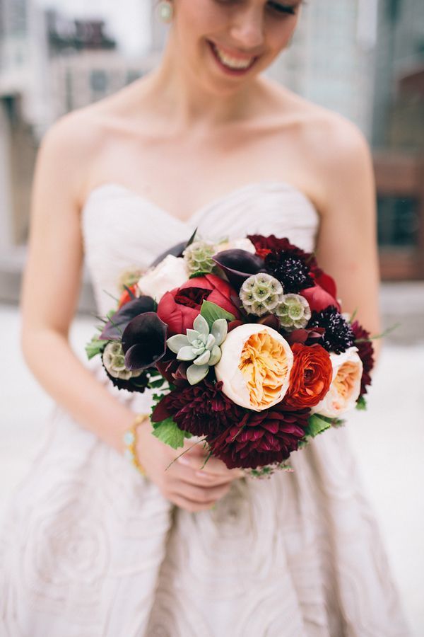 Fall wedding bouquet with David Austin roses, dahlias, peonies, succulents, and