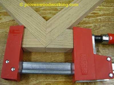For mitered corners or irregular corners, you can make triangular clamping block