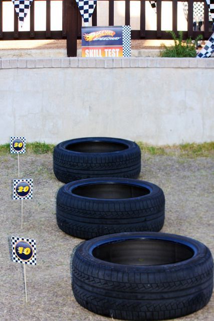 Hot Wheels party game — ball toss using old tires